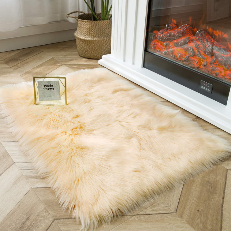 Everly Quinn Handmade Faux Sheepskin Yellow Rug & Reviews Wayfair